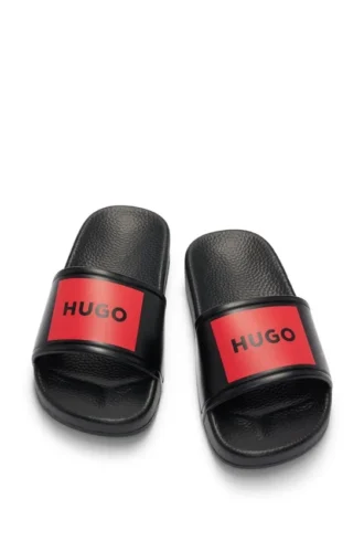 Kinderschlipper mit Logo-Riemen aus PVC