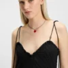 Kleid mit Burnout-Punkten und Spaghettiträgern