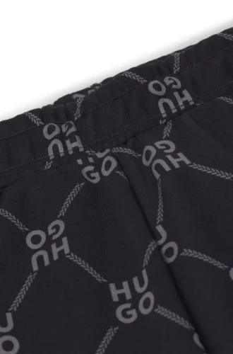 Locker sitzende Trainingshose für Kinder mit gestapeltem Logo-Print