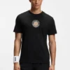 Lockeres T-Shirt aus Baumwolle mit Tennis-Motiv Lockeres T-Shirt aus Baumwolle mit Tennis-Motiv