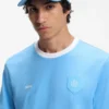 Logo-Cap aus glänzendem Twill mit Abzeichen in Nationalfarben