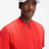 Logo-Cap aus glänzendem Twill mit Abzeichen in Nationalfarben Logo-Cap aus glänzendem Twill mit Abzeichen in Nationalfarben