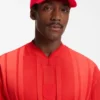 Logo-Cap aus glänzendem Twill mit Abzeichen in Nationalfarben Logo-Cap aus glänzendem Twill mit Abzeichen in Nationalfarben