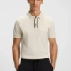 Paddy-Poloshirt mit Logo-Knopfleiste Paddy-Poloshirt mit Logo-Knopfleiste