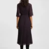 Plisseekleid mit Smok-Detail am Bund