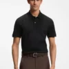 Polohemd aus Baumwolle mit geometrischem Jacquard-Muster Polohemd aus Baumwolle mit geometrischem Jacquard-Muster