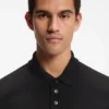Polohemd aus Baumwolle mit geometrischem Jacquard-Muster Polohemd aus Baumwolle mit geometrischem Jacquard-Muster
