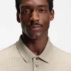 Polohemd aus Baumwolle mit geometrischem Jacquard-Muster Polohemd aus Baumwolle mit geometrischem Jacquard-Muster