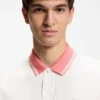 Polohemd aus Baumwolljersey mit Streifenbesatz Polohemd aus Baumwolljersey mit Streifenbesatz