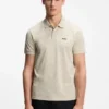 Polohemd aus Baumwollpiqué mit Allover-Print