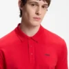 Polohemd aus Baumwollpiqué mit Logo-Print