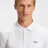 Polohemd aus Stretch-Baumwolle mit Allover-Print Polohemd aus Stretch-Baumwolle mit Allover-Print