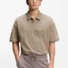 Polohemd in Oversize-Passform aus Baumwolle mit farblich abgestimmtem Logo Polohemd in Oversize-Passform aus Baumwolle mit farblich abgestimmtem Logo