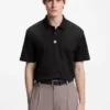 Polohemd mit gestapeltem Logo aus Interlock-Baumwolle Polohemd mit gestapeltem Logo aus Interlock-Baumwolle