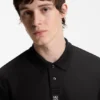 Polohemd mit gestapeltem Logo aus Interlock-Baumwolle Polohemd mit gestapeltem Logo aus Interlock-Baumwolle