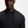 Poloshirt mit gerahmtem Reißverschluss aus Waffel-Jacquard Poloshirt mit gerahmtem Reißverschluss aus Waffel-Jacquard