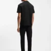 Porsche x BOSS T-Shirt in Relaxed-Fit mit Logo am Kragen Porsche x BOSS T-Shirt in Relaxed-Fit mit Logo am Kragen