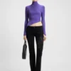 Pullover mit Logo-Applikation und asymmetrischem Saum