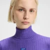 Pullover mit Logo-Applikation und asymmetrischem Saum
