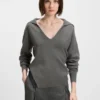 Pullover mit Spitzeneinsätzen aus Wolle und Kaschmir