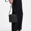 Reportertasche aus Kunstleder mit reflektierenden Details