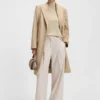 Ärmelloser Rollkragen-Pullover aus Merinowolle