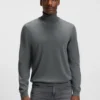 Rollkragen-Pullover aus Merinowolle in schmaler Passform Rollkragen-Pullover aus Merinowolle in schmaler Passform