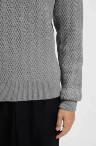 Rollkragen-Pullover aus Schurwolle mit Fischgrätenmuster