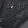 Rucksack mit mehreren Fächern und Lederbesatz