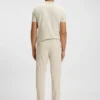 Schmal geschnittene Hose aus wasserabweisendem Stretchstoff Schmal geschnittene Hose aus wasserabweisendem Stretchstoff