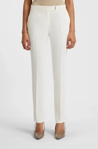 Schmal geschnittene Hose mit Seitenschlitzen