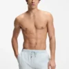 Schnelltrocknende Badeshorts aus Stretch-Seersucker