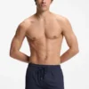 Schnelltrocknende Badeshorts aus Stretch-Seersucker