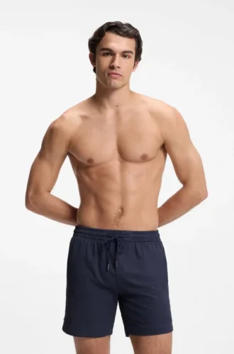 Schnelltrocknende Badeshorts aus Stretch-Seersucker
