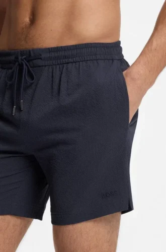 Schnelltrocknende Badeshorts aus Stretch-Seersucker