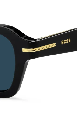Schwarze Acetat-Sonnenbrille mit goldfarbenen Verzierungen