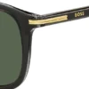 Schwarze Acetat-Sonnenbrille mit goldfarbenen Verzierungen