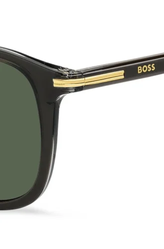 Schwarze Acetat-Sonnenbrille mit goldfarbenen Verzierungen
