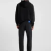 Schwarze Jeans mit schmal zulaufender Passform aus Denim mit Narbeneffekt