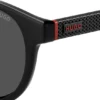 Schwarze Sonnenbrille mit rundem Rahmen und gemusterten Bügeln