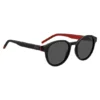 Schwarze Sonnenbrille mit rundem Rahmen und gemusterten Bügeln