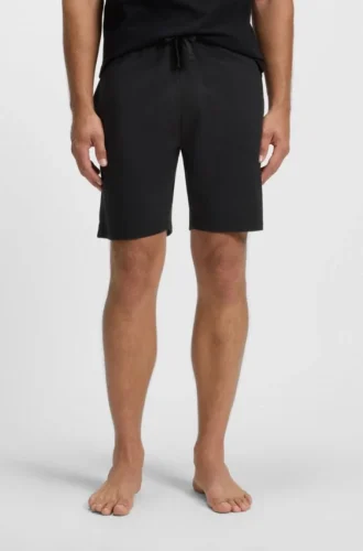 Shorts aus Baumwoll-Frottee mit Logo und Streifen