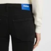 Slim-Fit-Jeans mit Strass-Logos