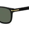 Sonnenbrille aus schwarzem Acetat mit goldfarbenen Metallbeschlägen Sonnenbrille aus schwarzem Acetat mit goldfarbenen Metallbeschlägen