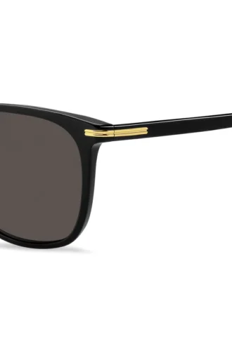 Sonnenbrille aus schwarzem Acetat mit goldfarbenen Verzierungen