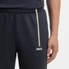 Sportliche Trainingshose aus thermoregulierendem Stretch-Gabardine Sportliche Trainingshose aus thermoregulierendem Stretch-Gabardine