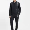 Sportliche Trainingshose aus thermoregulierendem Stretch-Gabardine Sportliche Trainingshose aus thermoregulierendem Stretch-Gabardine