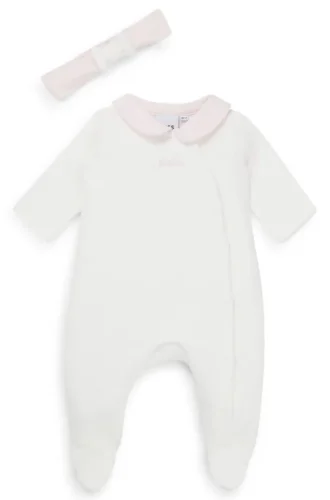 Strampler und Stirnband für Babys in Geschenkverpackung