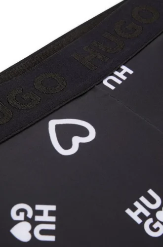 Stretch-Leggings für Kinder mit Logo und Herzchenprint