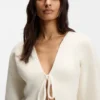 Strickjacke aus Rippstrick mit Bindeband vorne und Ballonärmeln